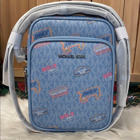 Michael Kors Handbags - Michael Kors Blue Graphic Messenger Bag